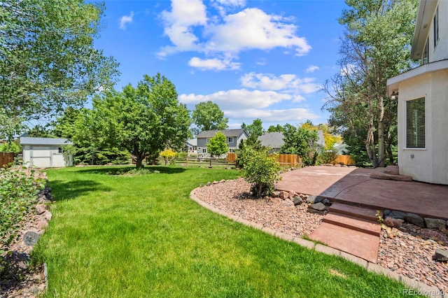 4960 Seton Pl, Colorado Springs, CO 80918 - view of yard with a patio area and a storage shed