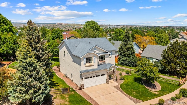 4960 Seton Pl, Colorado Springs, CO 80918 - view of subject property with a tree filled landscape
