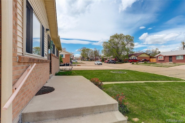 view of yard with a residential view