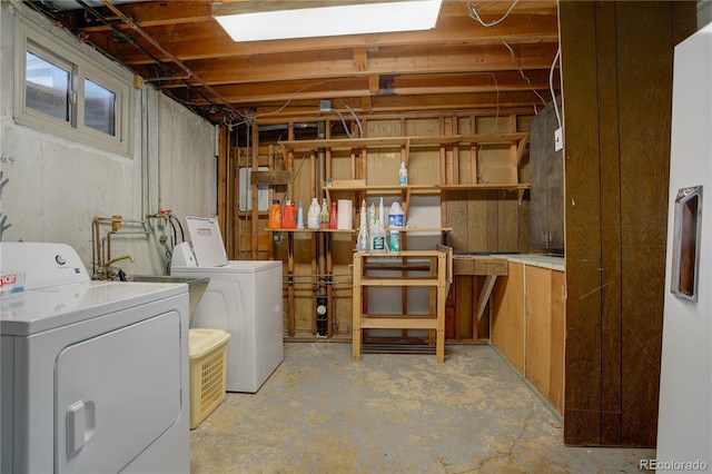 below grade area featuring separate washer and dryer