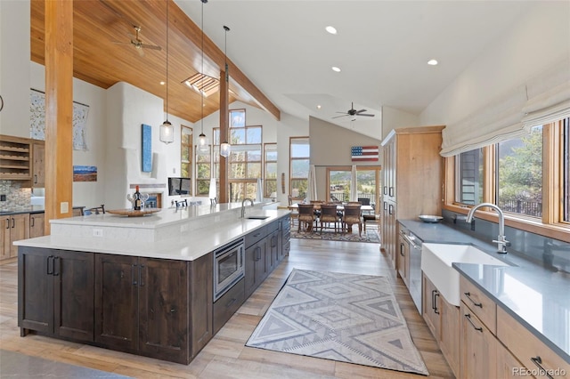 1107 Penstemon Rd, Dillon, CO 80435 - kitchen featuring stainless steel appliances, a healthy amount of sunlight, a sink, and ceiling fan