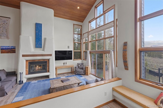 1107 Penstemon Rd, Dillon, CO 80435 - living area with wood ceiling, wood finished floors, high vaulted ceiling, and plenty of natural light
