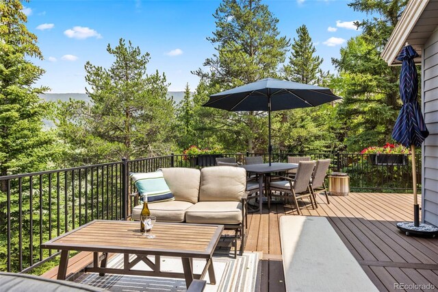 1107 Penstemon Rd, Dillon, CO 80435 - wooden terrace with outdoor dining area