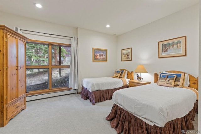 1107 Penstemon Rd, Dillon, CO 80435 - bedroom featuring a baseboard radiator, carpet flooring, and recessed lighting