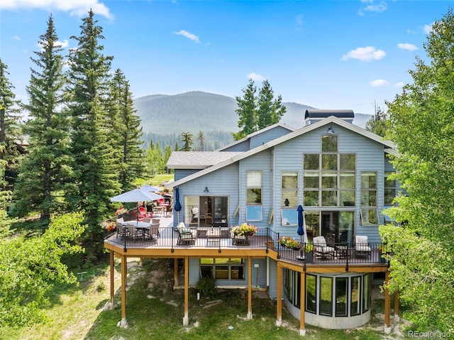 1107 Penstemon Rd, Dillon, CO 80435 - back of house featuring a deck with mountain view