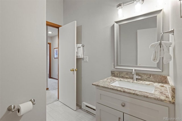 1107 Penstemon Rd, Dillon, CO 80435 - bathroom with vanity, a baseboard radiator, and baseboards
