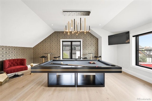 rec room featuring baseboards, pool table, wallpapered walls, wood finished floors, and lofted ceiling
