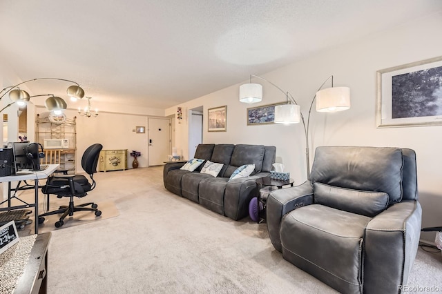 carpeted living area featuring a chandelier