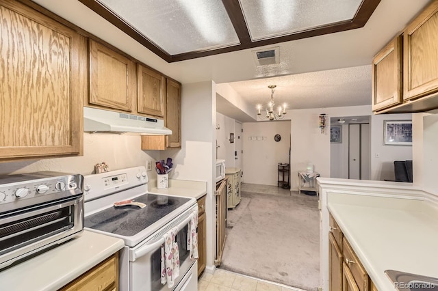 kitchen featuring visible vents, a toaster, a notable chandelier, under cabinet range hood, and white appliances