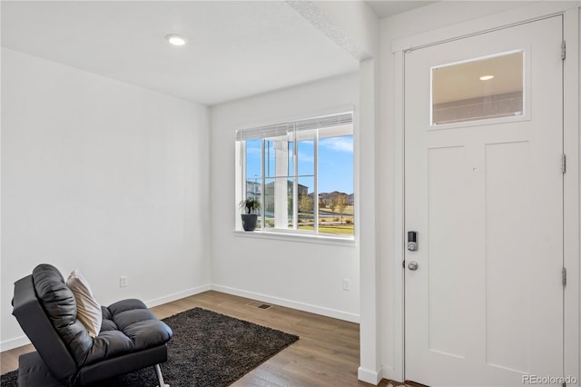 4125 Marble Dr, Longmont, CO 80504 - entrance foyer with wood finished floors, baseboards, and recessed lighting