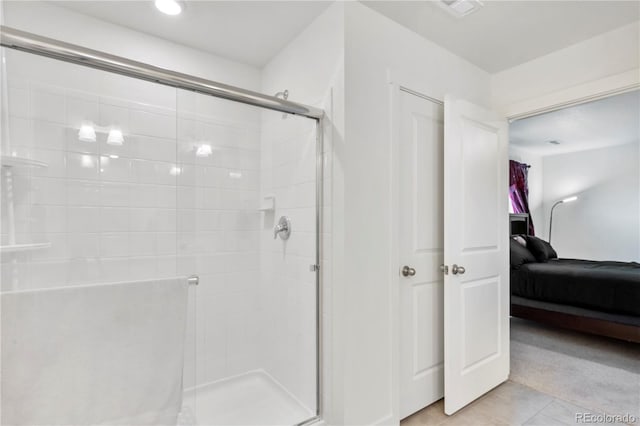 4125 Marble Dr, Longmont, CO 80504 - bathroom with ensuite bath, a shower stall, and tile patterned flooring