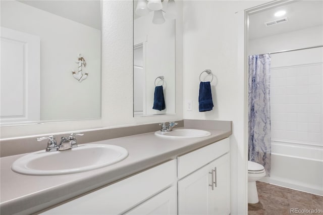 4125 Marble Dr, Longmont, CO 80504 - full bath featuring toilet, double vanity, and shower / bath combo with shower curtain