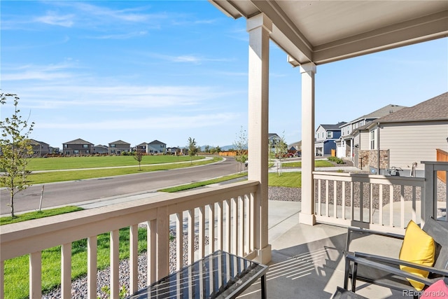 4125 Marble Dr, Longmont, CO 80504 - balcony with covered porch and a residential view