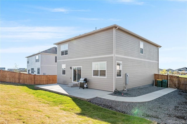 4125 Marble Dr, Longmont, CO 80504 - rear view of house with a patio