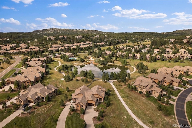 birds eye view of property featuring a residential view and a water view