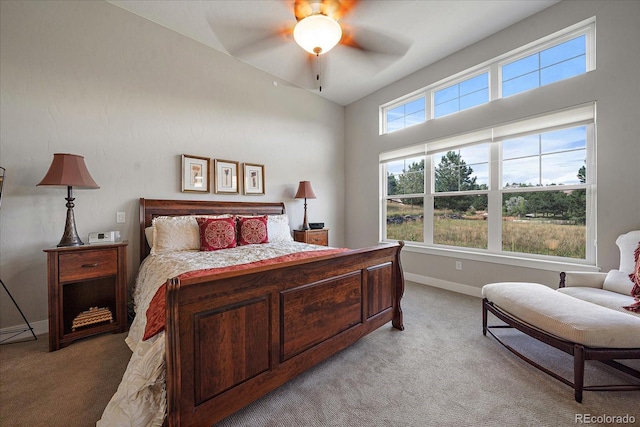 bedroom with ceiling fan and light colored carpet