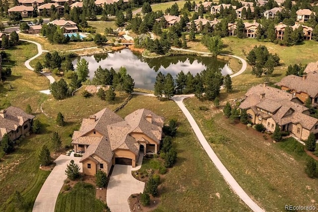 5069 Castle Pines Dr S, Castle Rock, CO 80108 - aerial view of property's location with a large body of water and nearby suburban area
