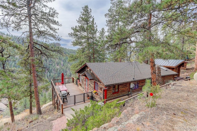 16048 Old Stagecoach Rd, Pine, CO 80470 - view of subject property with a forest