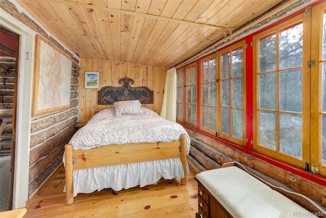 16048 Old Stagecoach Rd, Pine, CO 80470 - bedroom featuring wooden ceiling and hardwood / wood-style floors