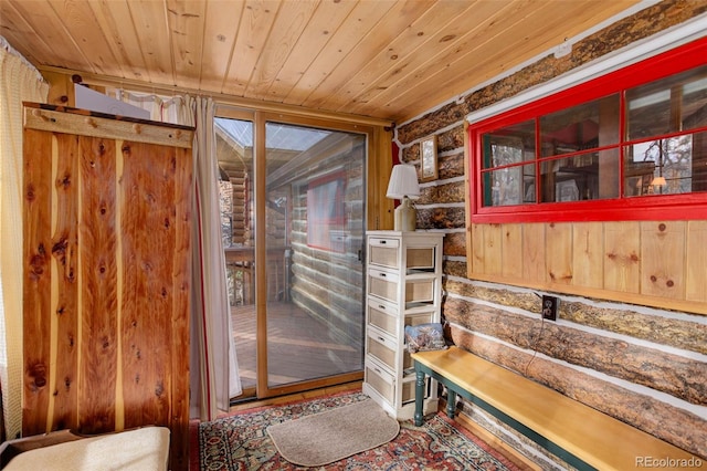 16048 Old Stagecoach Rd, Pine, CO 80470 - entryway featuring wooden ceiling and wooden walls