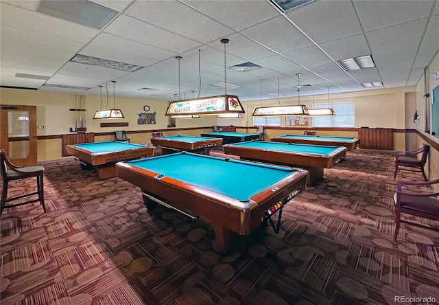 recreation room with billiards, a paneled ceiling, and carpet flooring