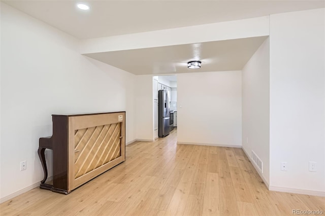 hall featuring light hardwood / wood-style floors