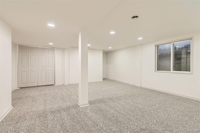 basement featuring carpet flooring