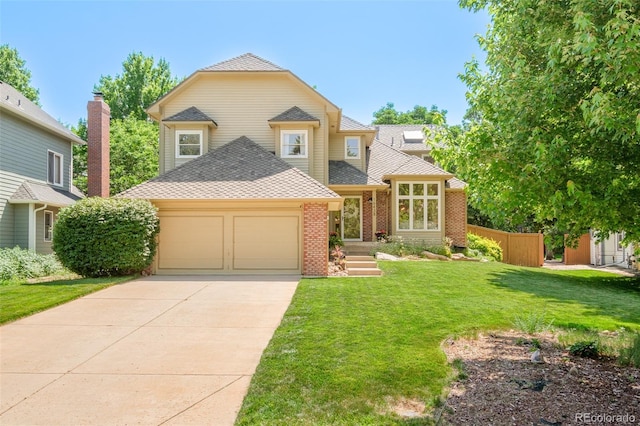 16438 E Prentice Cir, Centennial, CO 80015 - view of front of house featuring a garage, brick siding, a shingled roof, and concrete driveway