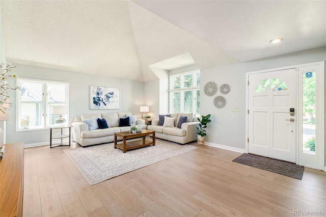 16438 E Prentice Cir, Centennial, CO 80015 - foyer featuring light wood finished floors and vaulted ceiling