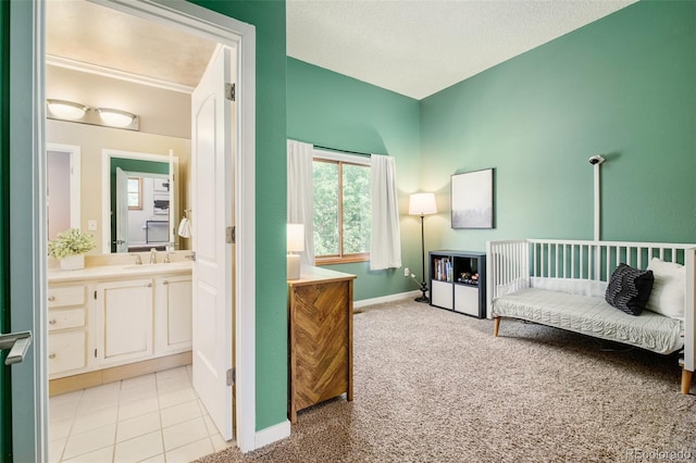 16438 E Prentice Cir, Centennial, CO 80015 - bedroom featuring light carpet, connected bathroom, and light tile patterned floors