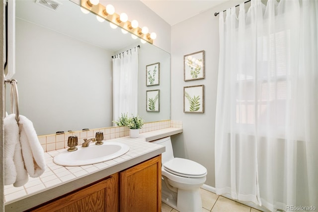 16438 E Prentice Cir, Centennial, CO 80015 - bathroom with vanity, tile patterned floors, and curtained shower