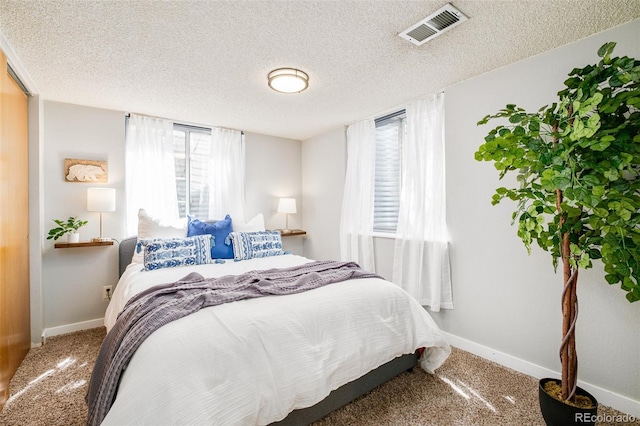 16438 E Prentice Cir, Centennial, CO 80015 - carpeted bedroom featuring baseboards and a textured ceiling