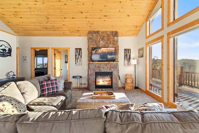 270 Piaute Way, Como, CO 80432 - living area featuring lofted ceiling, wood ceiling, and a stone fireplace