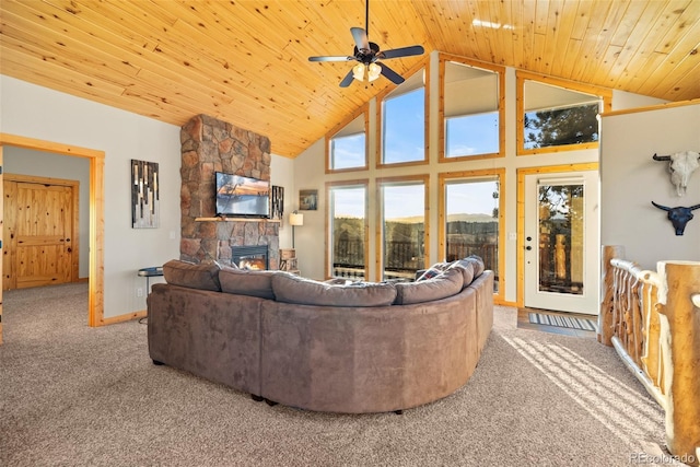270 Piaute Way, Como, CO 80432 - carpeted living area featuring high vaulted ceiling, a fireplace, wood ceiling, and ceiling fan