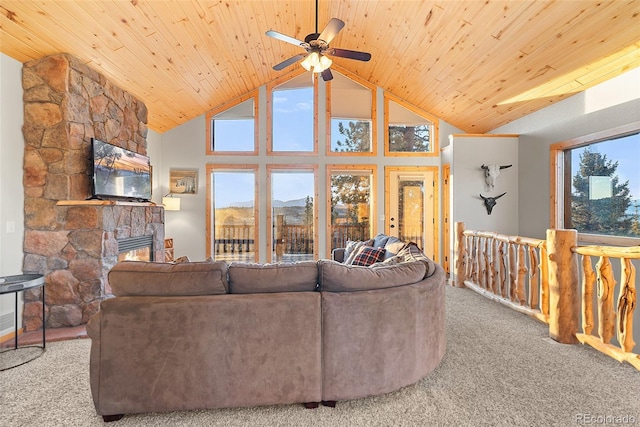 270 Piaute Way, Como, CO 80432 - living area with carpet, a stone fireplace, a ceiling fan, wood ceiling, and high vaulted ceiling