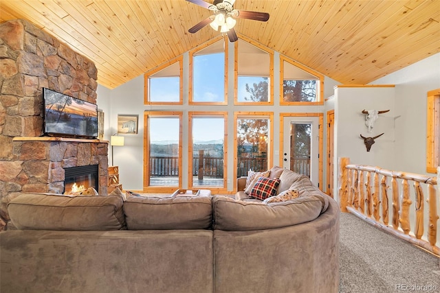 270 Piaute Way, Como, CO 80432 - carpeted living room featuring a stone fireplace, ceiling fan, high vaulted ceiling, and wood ceiling