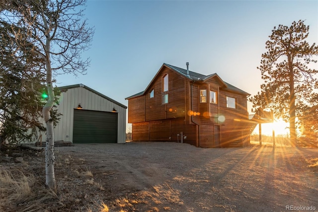 270 Piaute Way, Como, CO 80432 - view of side of property featuring dirt driveway, a garage, and an outdoor structure
