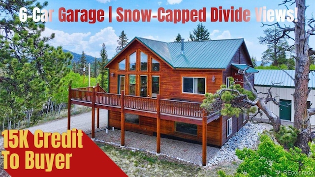 270 Piaute Way, Como, CO 80432 - back of property with a deck with mountain view and a metal roof