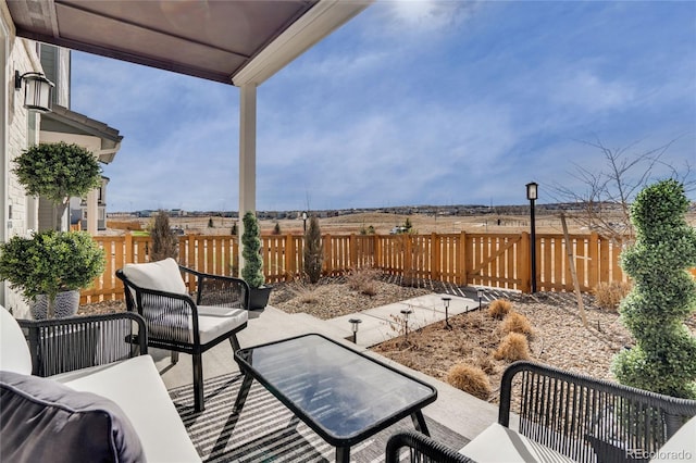 view of patio featuring a fenced backyard and an outdoor hangout area