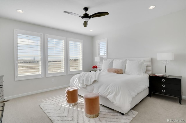 bedroom featuring light carpet, recessed lighting, a ceiling fan, and baseboards