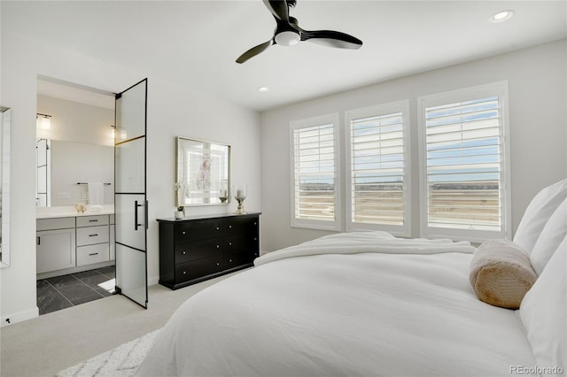 bedroom featuring a ceiling fan, recessed lighting, carpet flooring, and ensuite bathroom