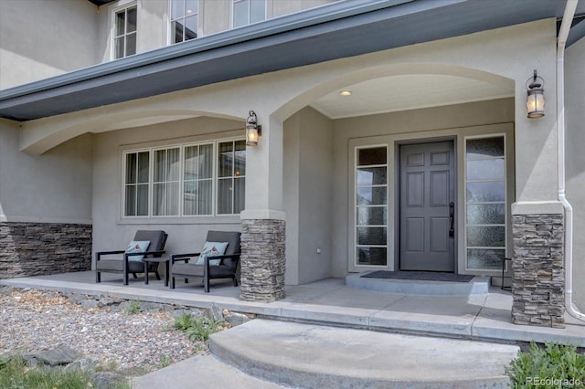 14993 W 55th Dr, Golden, CO 80403 - view of exterior entry with stucco siding