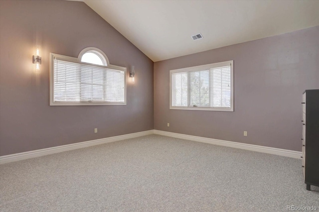 14993 W 55th Dr, Golden, CO 80403 - empty room featuring carpet, vaulted ceiling, and baseboards
