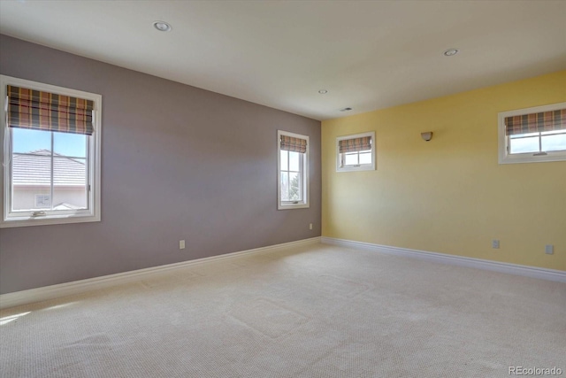 14993 W 55th Dr, Golden, CO 80403 - carpeted empty room with healthy amount of natural light, baseboards, and recessed lighting