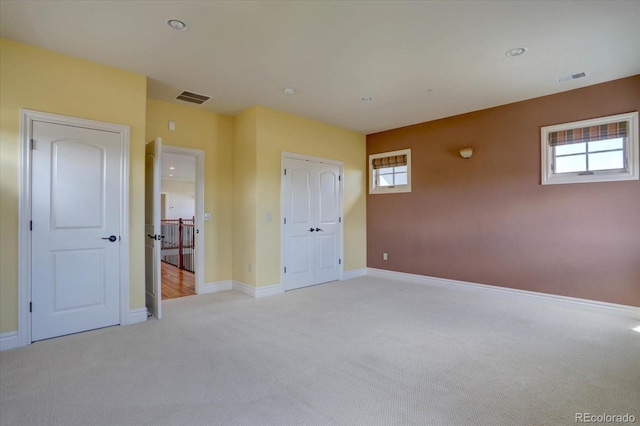 14993 W 55th Dr, Golden, CO 80403 - unfurnished bedroom featuring light carpet and baseboards