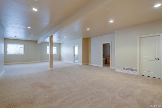 14993 W 55th Dr, Golden, CO 80403 - basement with light carpet, baseboards, and recessed lighting