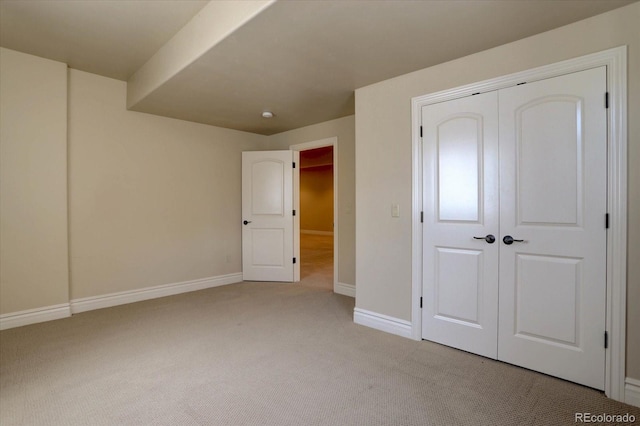 14993 W 55th Dr, Golden, CO 80403 - unfurnished bedroom with light carpet, a closet, and baseboards