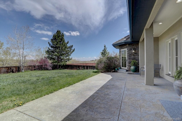 14993 W 55th Dr, Golden, CO 80403 - view of yard featuring a patio