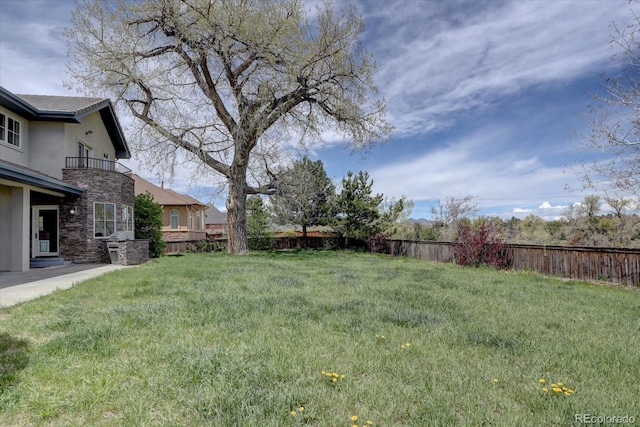 14993 W 55th Dr, Golden, CO 80403 - view of yard with a balcony