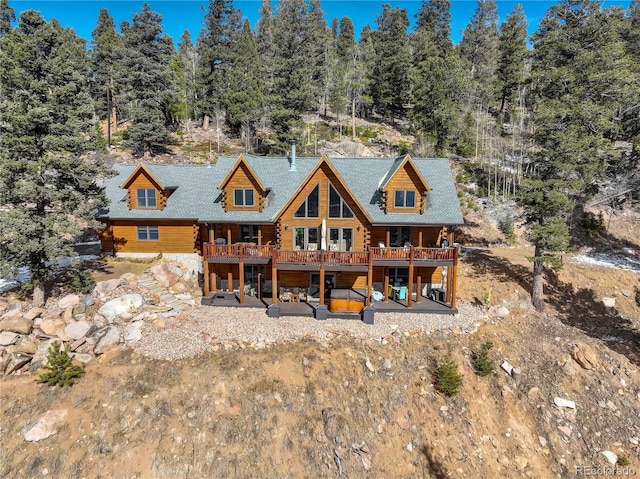 11450 Marks Dr, Conifer, CO 80433 - back of house with a patio area, a deck, and log exterior
